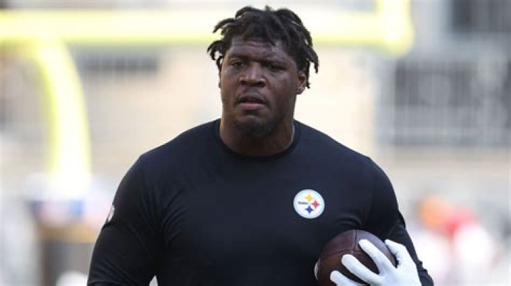 Unveiling The Strength Behind Darnell Washington's Weight Dominance